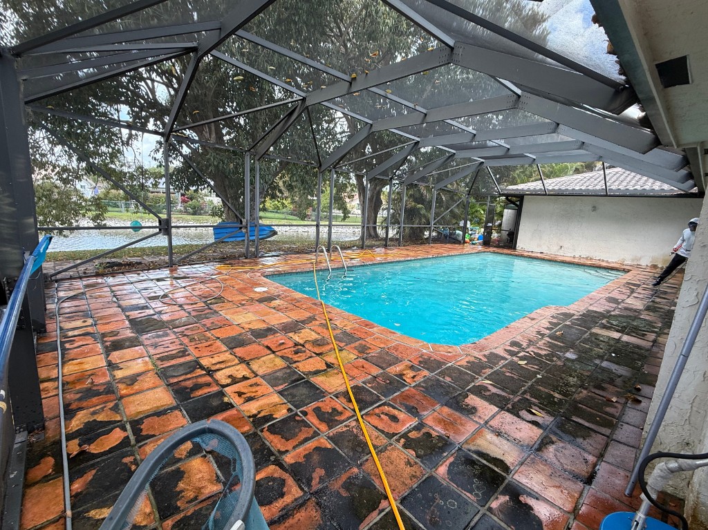 Coral Springs pool deck pavers before cleaning