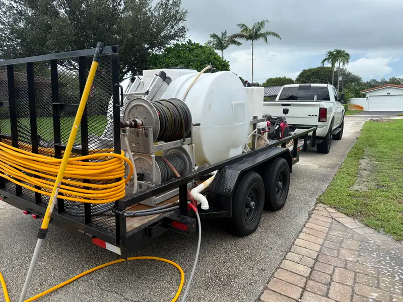 PPW pressure washing trailer with water tank, hose reels, and wash equipment