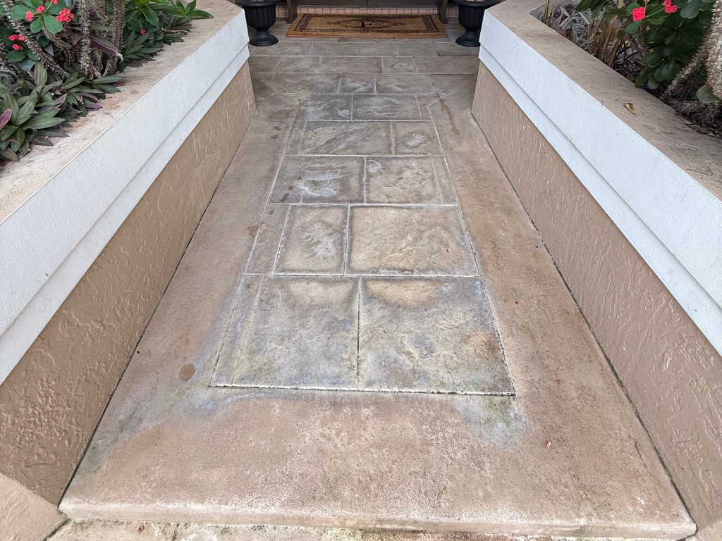 Stamped concrete before paint restoration